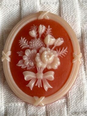 Avon Coral Orange and Cream Floral Cameo Brooch. (4)